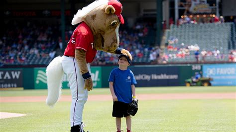 5 Year Old Adopted Through Buckner Throws Out First Pitch At Texas