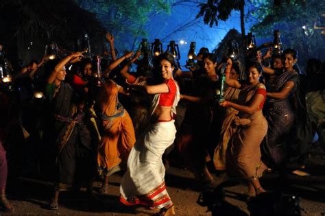 Similar to the image of a town as seen in the mirror, when one sees the image of the world within him, the world appears as if it is outside. Nayanthara Hot Saree Images in Krishnam Vande Jagadgurum ...