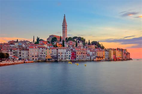 Rovinj Old Town At Night With Moon On The Colorful Sky Adriatic Sea