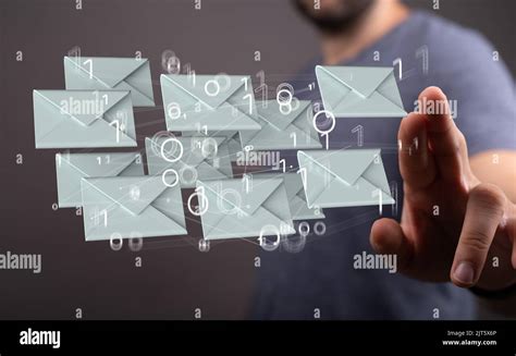 A 3d Rendered Electronic Mail Hovering In Mans Hand Stock Photo Alamy