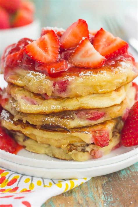 This greek yogurt pancakes recipe is a bit lighter than your usual pancake recipe. Strawberry Greek Yogurt Pancakes | FaveSouthernRecipes.com