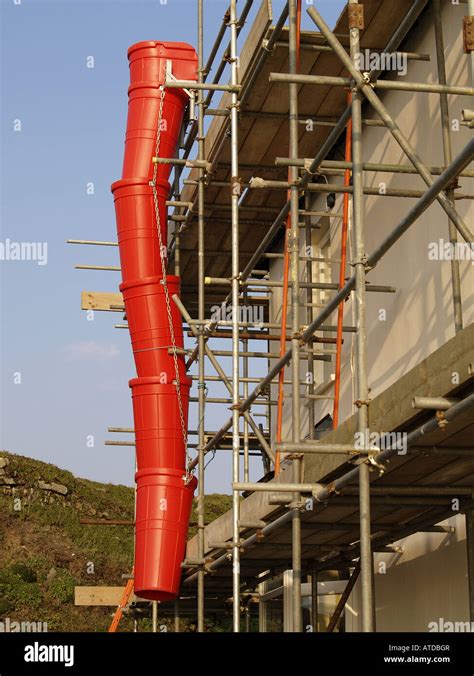 Scaffolding With Red Rubbish Chute Stock Photo 16282870 Alamy