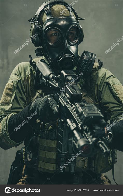 Special Unit Soldier With Gasmask And Tactical Equipment Stock Photo By
