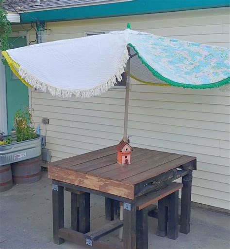 How to create a unique diy umbrella stand! How to DIY a Patio Umbrella Cover - Little Vintage Cottage