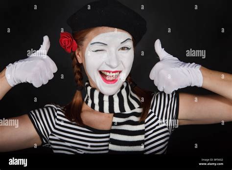 Portrait Of A Young Lady Dressed Up As A Mime Isolated On White