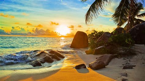 Download Tropical Sunset Rocky Beach Wallpaper