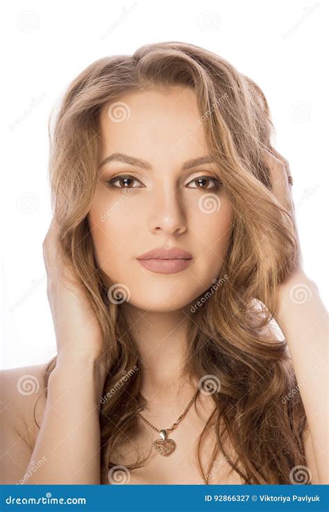 Attractive Woman Face With Nude Makeup At Studio On White Background