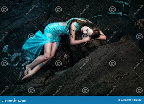 Woman Posing On A Beach With Rocks Stock Image Image Of Beach Ocean 63303091