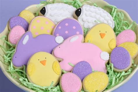 These easy ways to decorate biscuits with icing and sweets include monster, alien, lego, flower and teacup designs. Cute Easter Cookies {How-to} - Glorious Treats