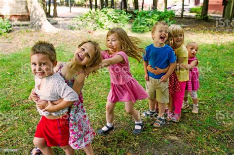 Cute Children Playing At Park Stock Photo 587229698 Istock