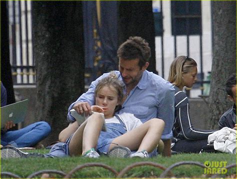 Bradley Cooper Suki Waterhouse Snuggle In Paris Park Photo Bradley Cooper Photos