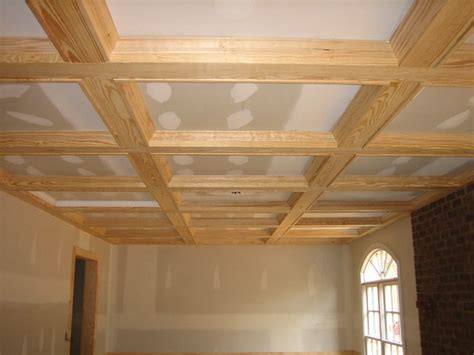 We made our diy coffered ceiling for less than $500 by swapping out crown molding for stacked cheaper trim! coffered ceiling | www.thefinishingcompany.net/ | By ...