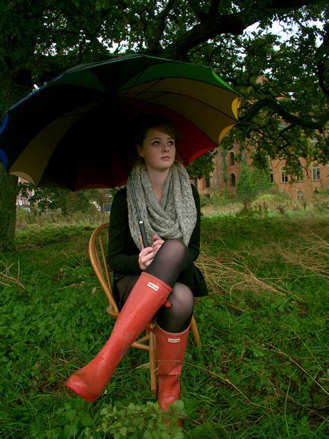 Her Black Tights And Red Wellingtons Look Really Good Together Rain Boots Fashion Womens