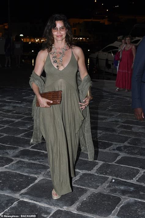 Gina Gershon Puts On A Busty Display In A Plunging Sage Green Maxi