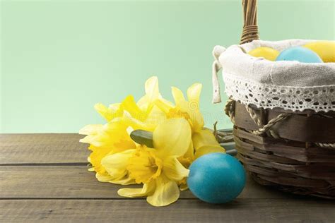 Basket With Easter Cake And Red Eggs On Rustic Wooden Table Top Stock