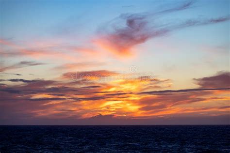 Dramatic Colorful Sunset Sky Over North Atlantic Ocean Cloudscape