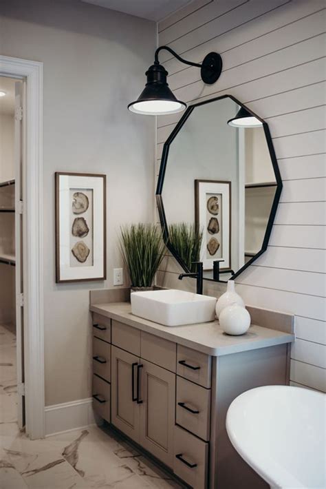 Updating your vanity can add tons of style and personality to your bathroom. hexagonal-bathroom-mirror-ideas | HomeMydesign