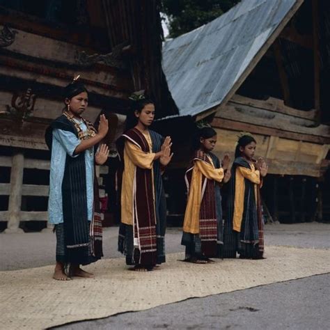 Toba Batak People Performing A Traditional Dance Wearing Ulos