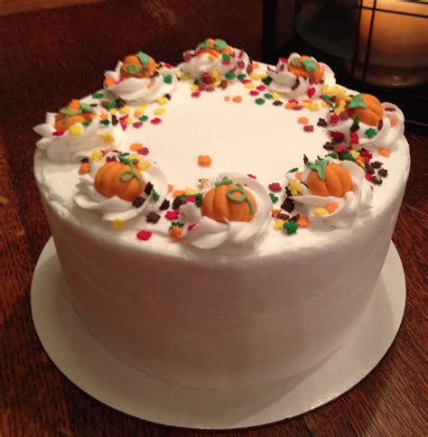Piped buttercream fall leaves fall cakes thanksgiving. Simple Fall or Thanksgiving buttercream frosted cake. Decorated with leaf sprinkles and Wilton ...