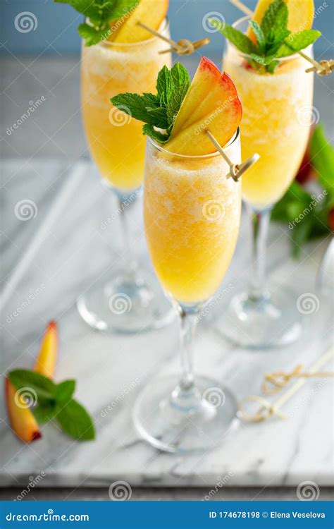 Summertime Peach Mimosas Or Bellinis Stock Photo Image Of Fizzy