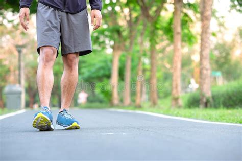 Young Athlete Man With Running Shoes In The Park Outdoor Male Runner