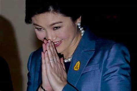 thailand pm yingluck shinawatra may be banned from politics if proven guilty world news zee news