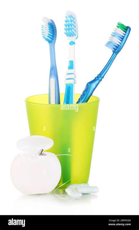 Toothbrushes Chewing Gum And Dental Floss Isolated On White Stock