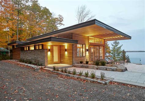 A Stylish Pair Of Modern Cottages Lost Among The Beautiful Canadian