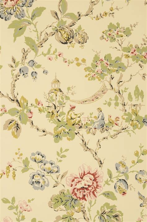 An Old Wallpaper With Flowers And Leaves On Its Side In Pastel Colors