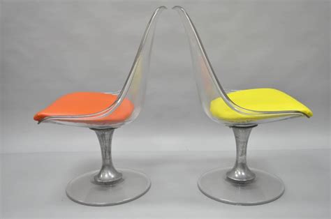Check spelling or type a new query. Four Lucite Chromcraft Tulip Swivel Dining Chairs Mid ...
