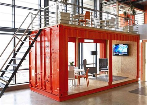 A Bright Red Shipping Container At The Entrance To The Offices Of Cape