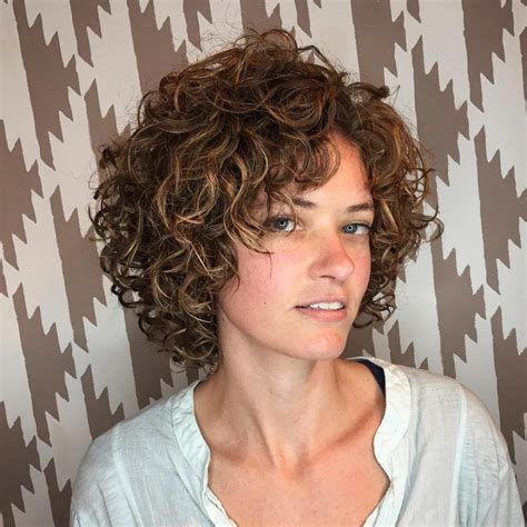 The 16 Cutest Examples Of Naturally Curly Hair With Bangs Short Curly Haircuts Thick Hair