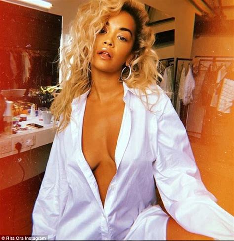Rita Ora Goes Braless As She Poses In An Open Shirt In Instagram Post