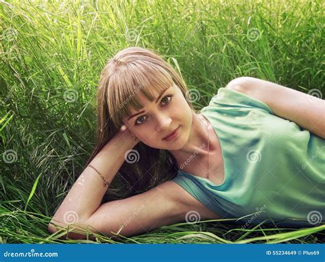 Young Beautiful Girl Lying On The Grass Stock Image Image Of Lifestyle Outside 55234649