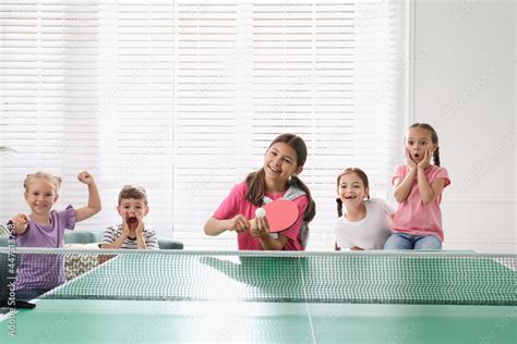 Cute Happy Children Playing Ping Pong Indoors Stock Photo Adobe Stock