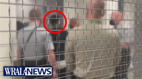 Raw: Man charged in deputy's murder moved to Wake County jail - YouTube