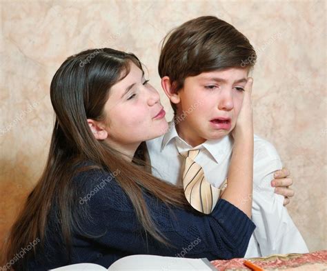 Daughter Comfort Crying Son Stock Photo By ©ulianna 63425107
