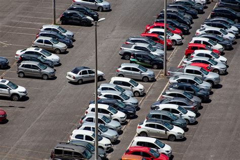 Cars Parked On Parking Lot During Daytime Photo Free Car Image On