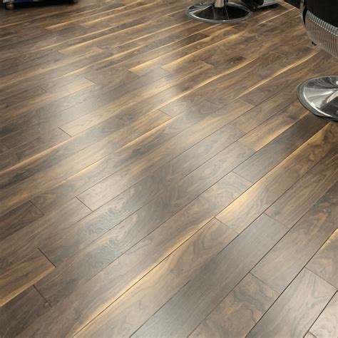 Menards® offers a variety of laminate wood flooring as a more durable alternative to hardwood floors and laminate tile flooring to achieve the stone look you desire. Dark Walnut Laminate Flooring | Discount Flooring Depot