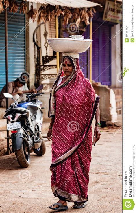 woman carries her load on her head editorial stock image image of rural indian 116481024