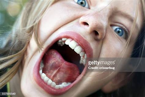 Mouth Open Girl Photos And Premium High Res Pictures Getty Images