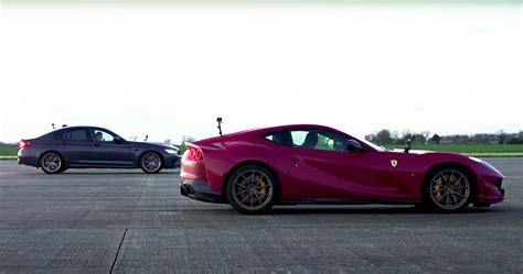 Watch This Ferrari Drag Race A New Bmw M Cs