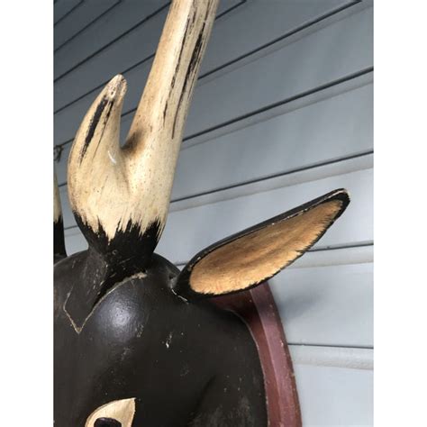 Maybe you would like to learn more about one of these? Vintage Folk Art Wood Carved Deer Head With Antlers | Chairish