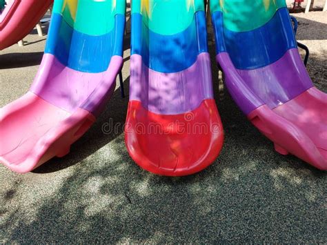 Multicolored Plastic Slides On Playground Stock Photo Image Of