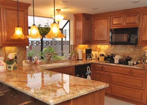 We stay on top of kitchen countertop ideas and tips so that you don't have to! Image result for quartz with oak cabinets | Kitchen ...