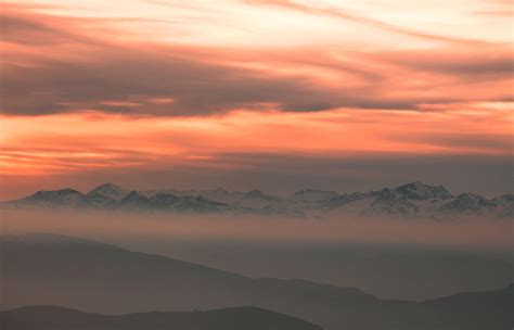 Free Download Hd Wallpaper Silhouette Of Mountains Over Cloudy Sky