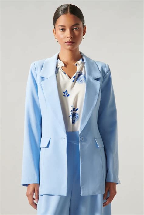 the best blue blazers for women to buy right now — raydar magazine