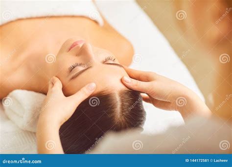 Face Massage Close Up Beautiful Girl Has A Facial Massage Stock Image Image Of Enjoying