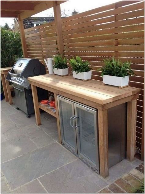 Step up your entertaining game with one of these diy outdoor kitchen plans that you can put outside on an existing patio, deck, or area of your yard. 65 Learn More About Building Your Own Outdoor BBQ Area 24 - myhomeorganic #outdoordecoration # ...