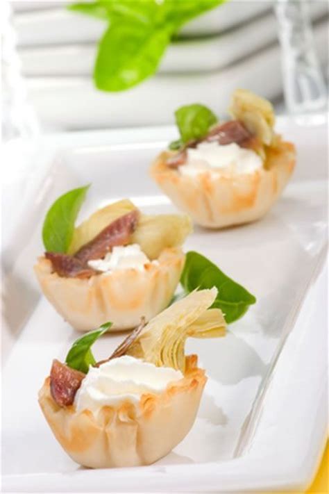 Try a few of these appetizers at your next dinner party or special occasion. This cold appetizer recipe takes mere minutes to put together but these cute filo shells with ...